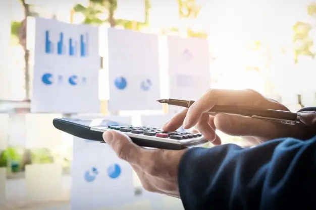 business-finance-man-calculating-budget-numbers-invoices-and-financial-adviser-working_1423-120